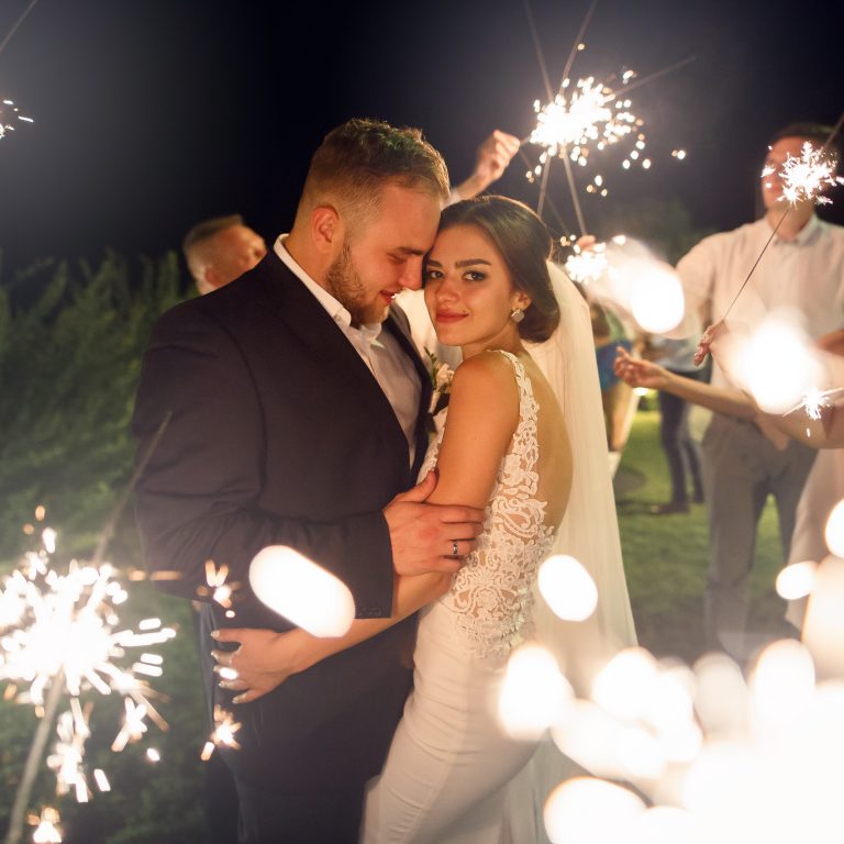 Newlyweds with Sparklers are happy they chose a Michigan Wedding DJ