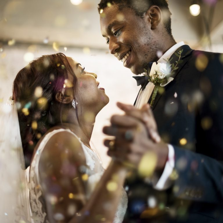 Bride and Groom enjoy their first dance thanks ti their Michigan Wedding DJ